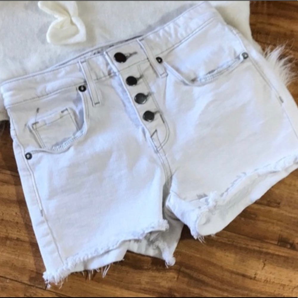 White high waisted denim shorts.